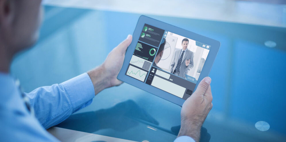 composite image businessman using his tablet 1 e1701321192132